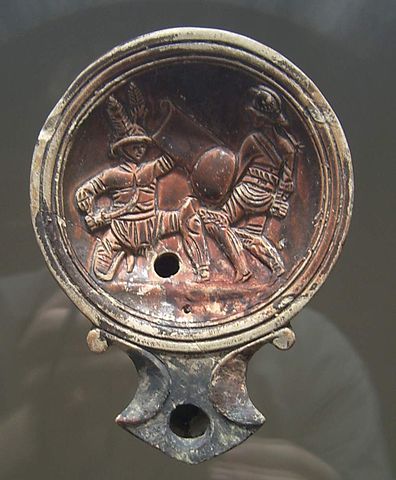 Roman Oil lamp depicting gladiators fighting